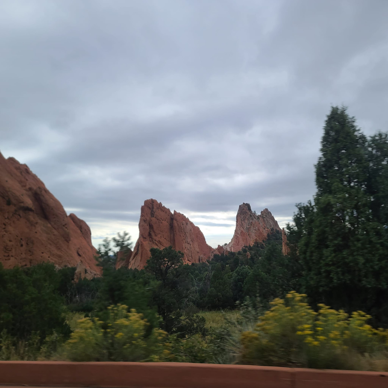 Red rock landscape before photo cleanup